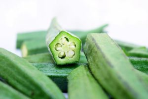 cut okra green pentagon white seeds white background nutrients from plants calcium