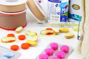 dietary supplements medicine pink pills red pills oil pills thermometer probiotics blue pills